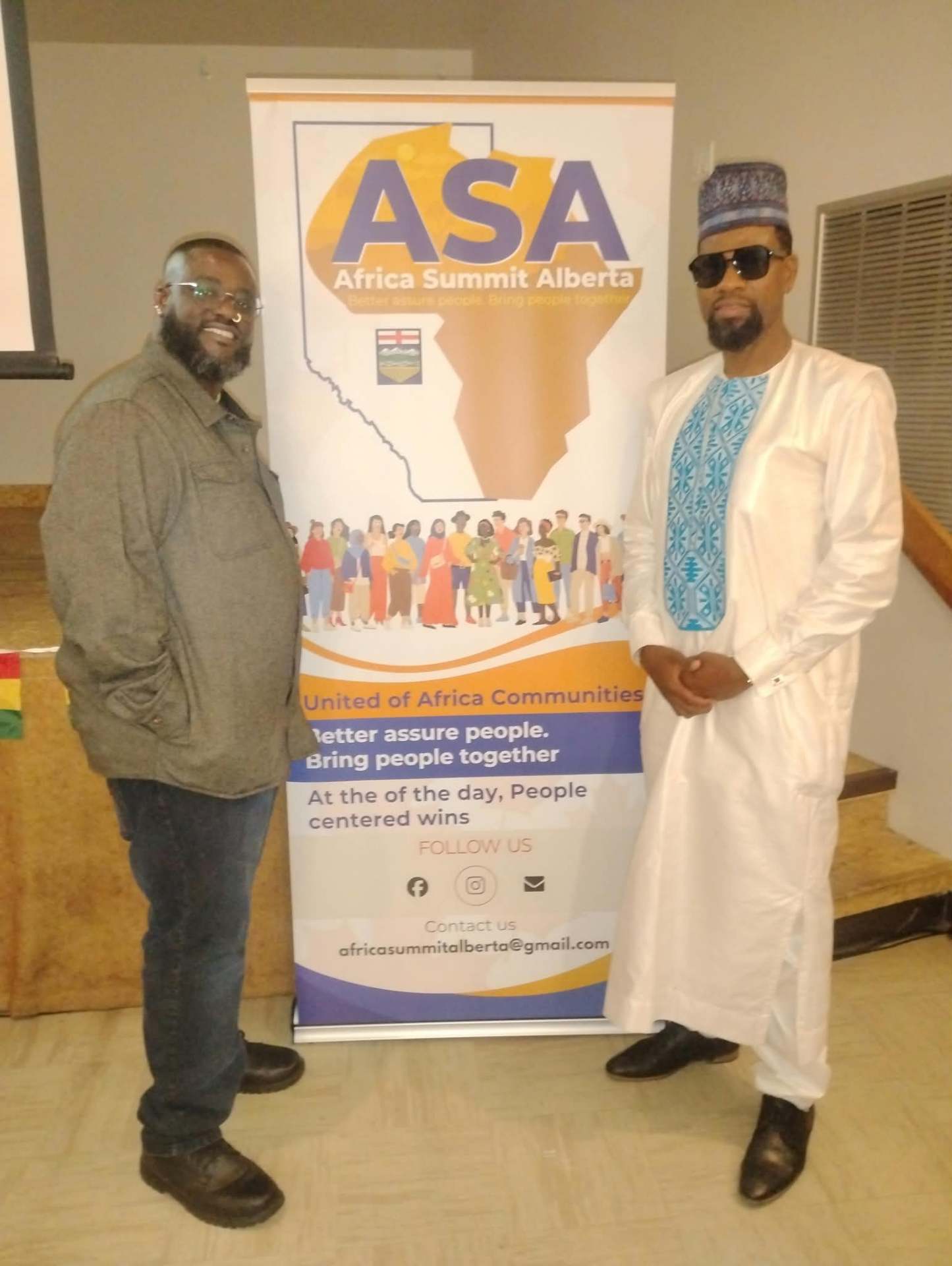 ASA representatives at the organization banner